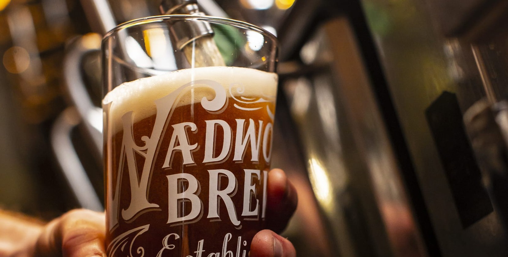 A pint of Wadworth Brewery's beer being pulled from the pump.