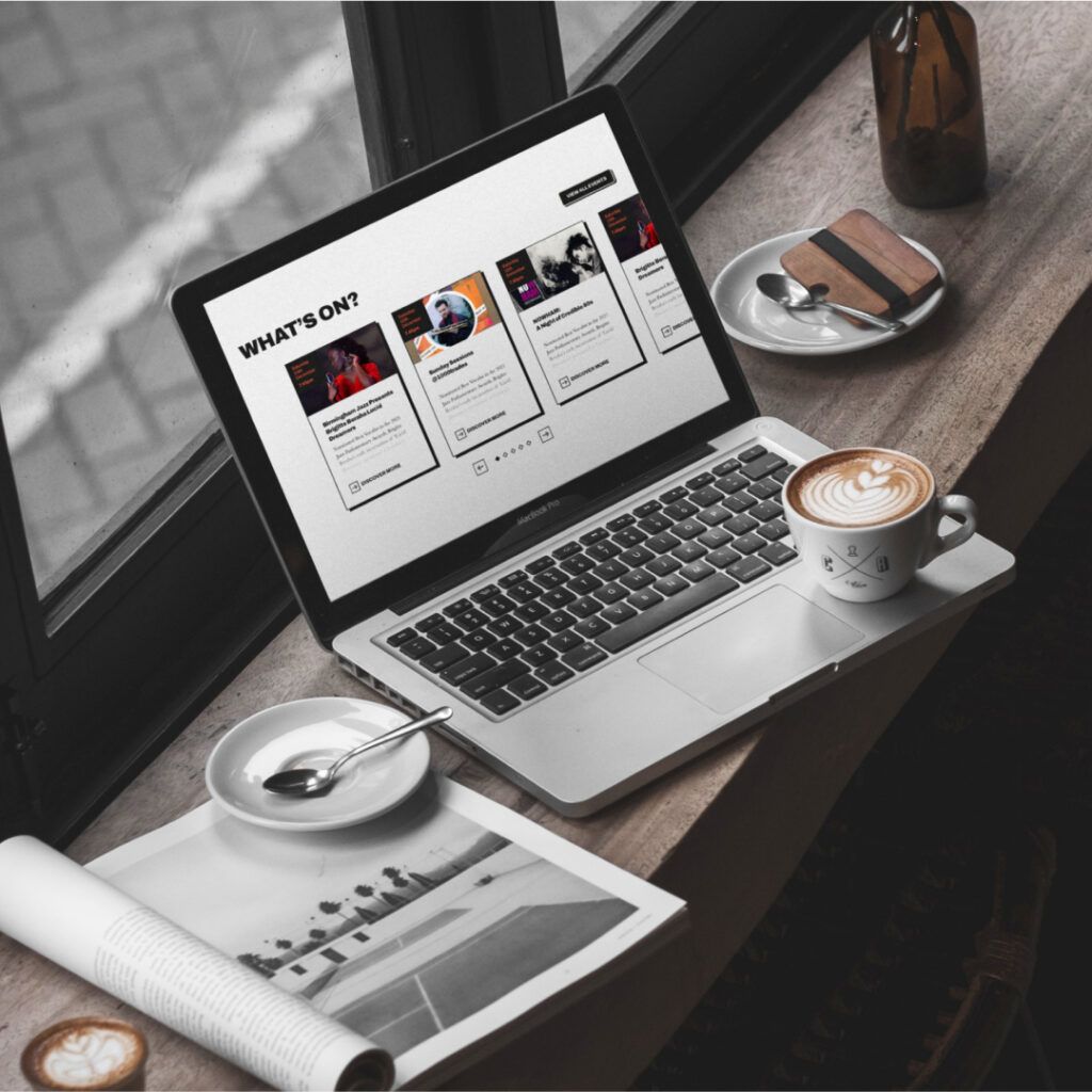 A graphic showing branding designs against a wooden background.