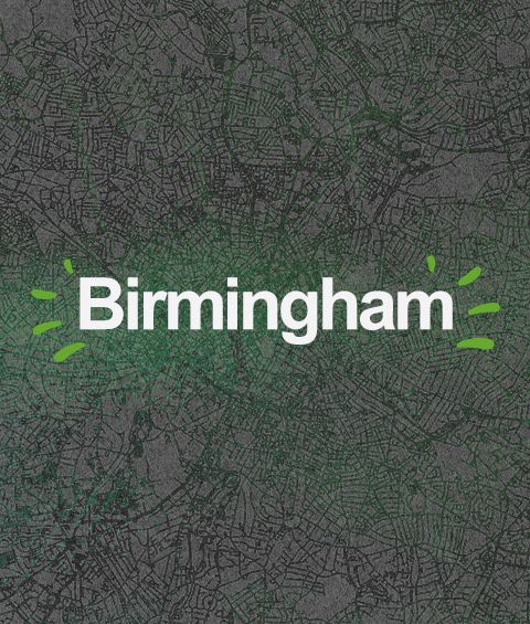 Birmingham written over a monotone version of a map of the city. 