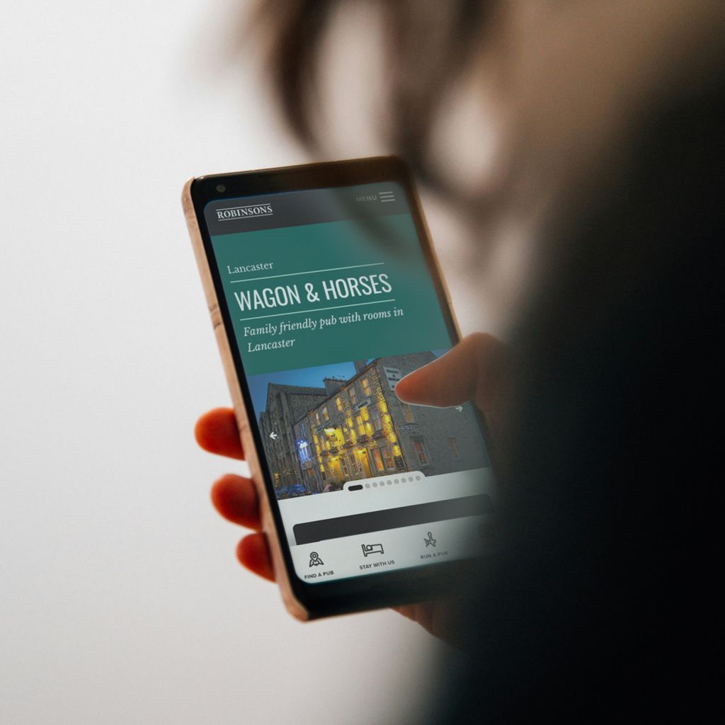 A pub-specific listing for Wagon &amp; Horses being shown on a phone screen.