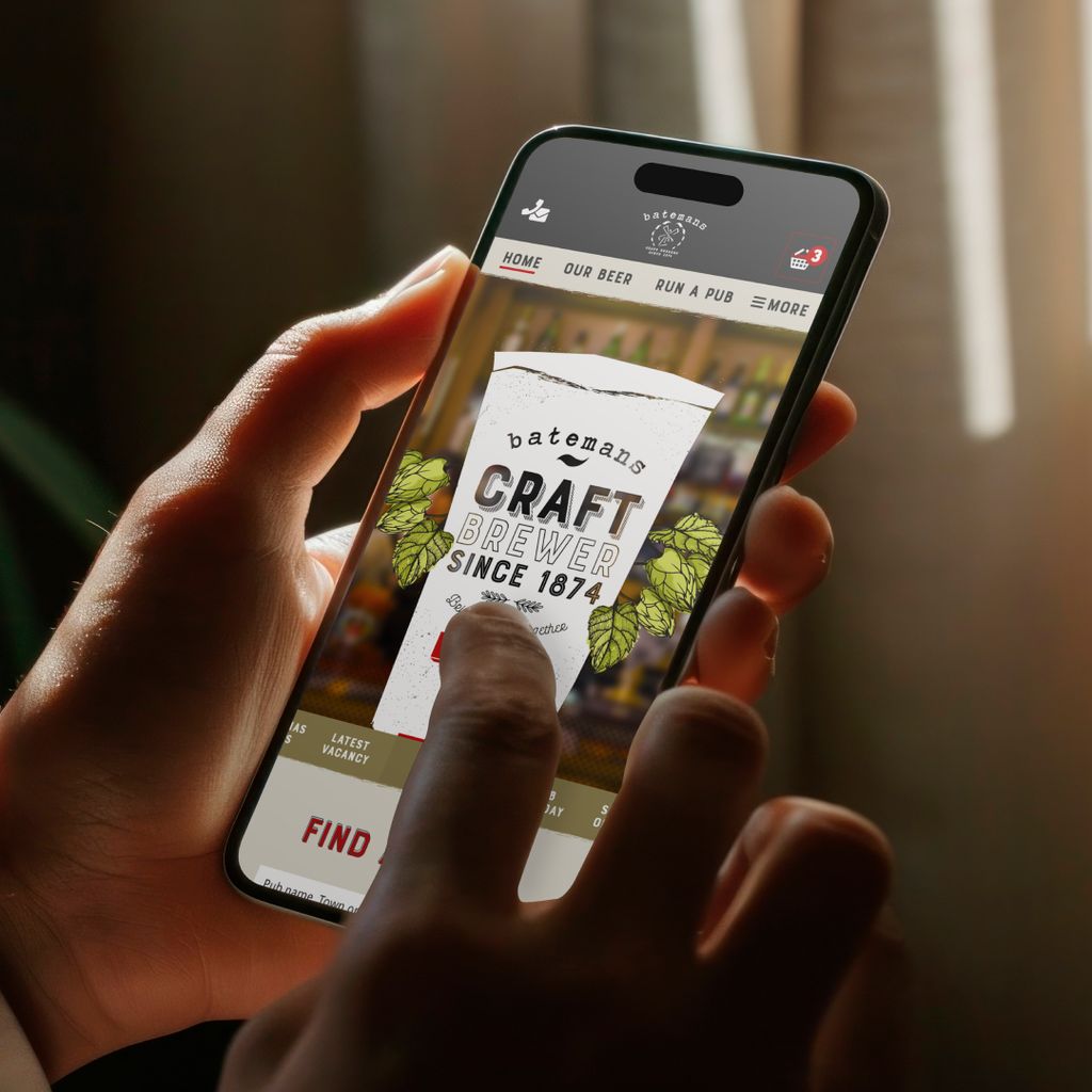 Someone looking at the Batemans Brewery website homepage on their iPhone. 