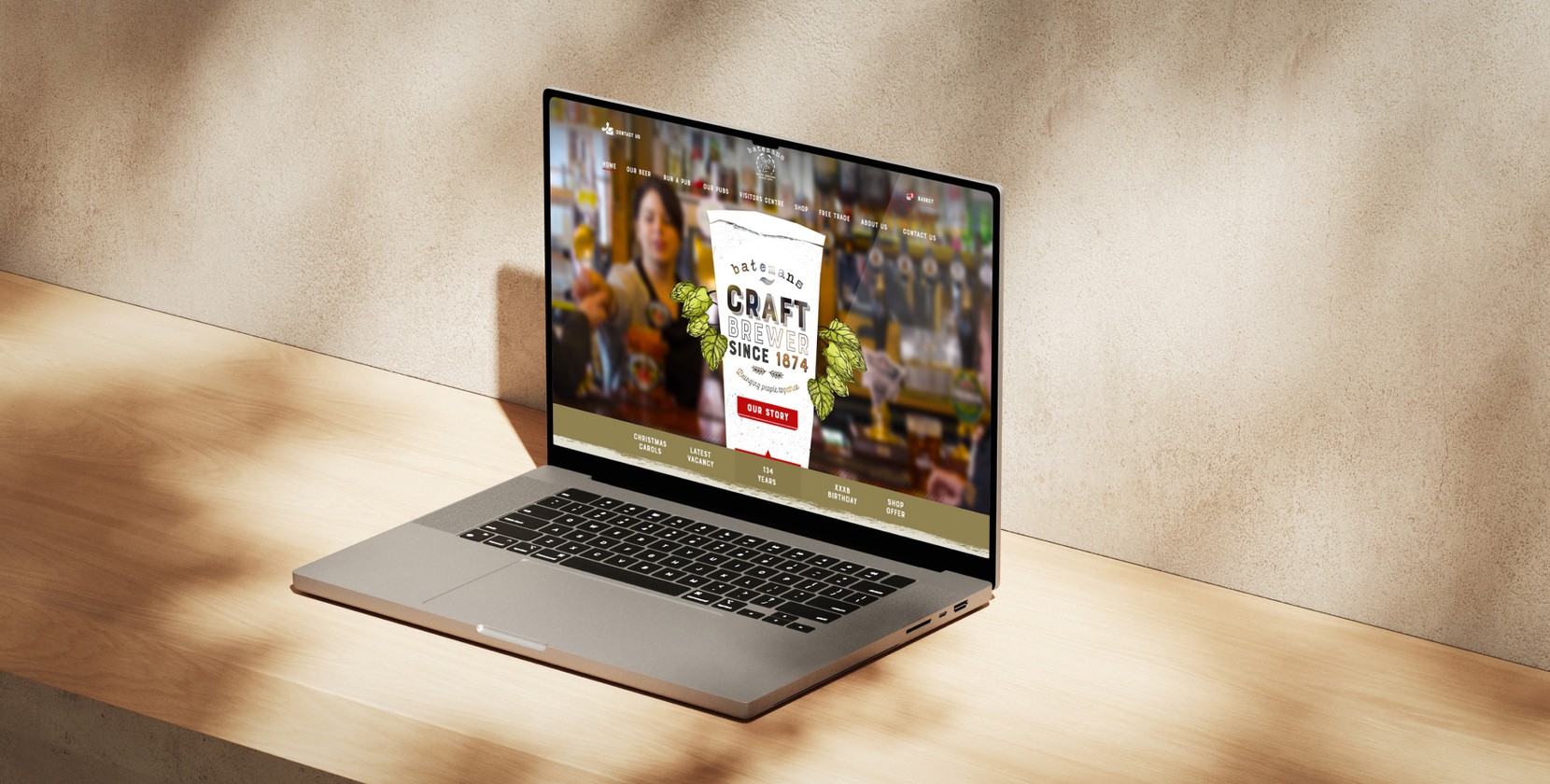 An open laptop with the Batemans Brewery homepage shown. 