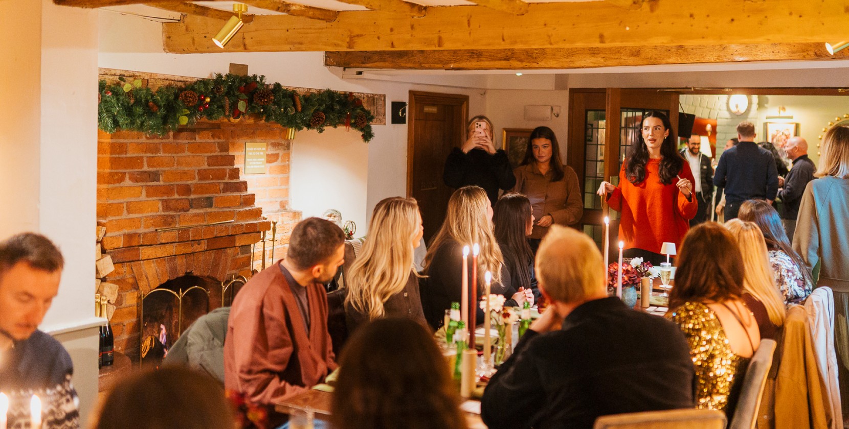Beatrice (Brew social media account manager) briefs a table of content creators on the brand festive campaign at a premium Mitchells and Butlers venue.