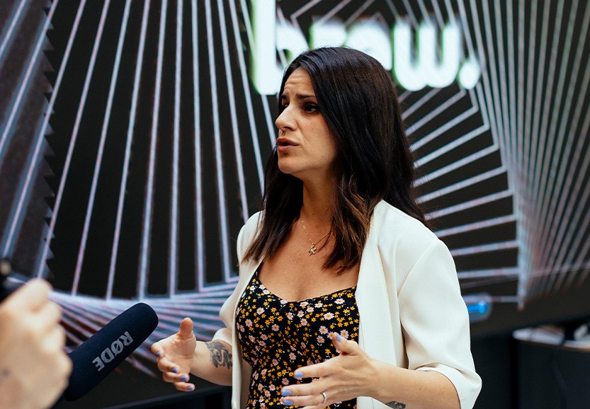 A photograph of Sophie Page-Britton, Brew’s SEO specialist, speaking at the 2023 Brew Conference. 