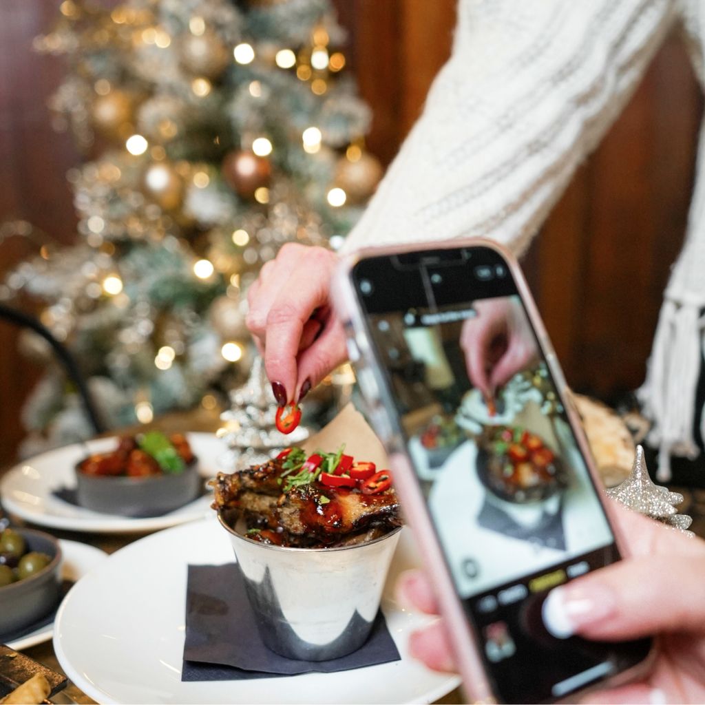 The finishing touches of chilli being added to a starter.