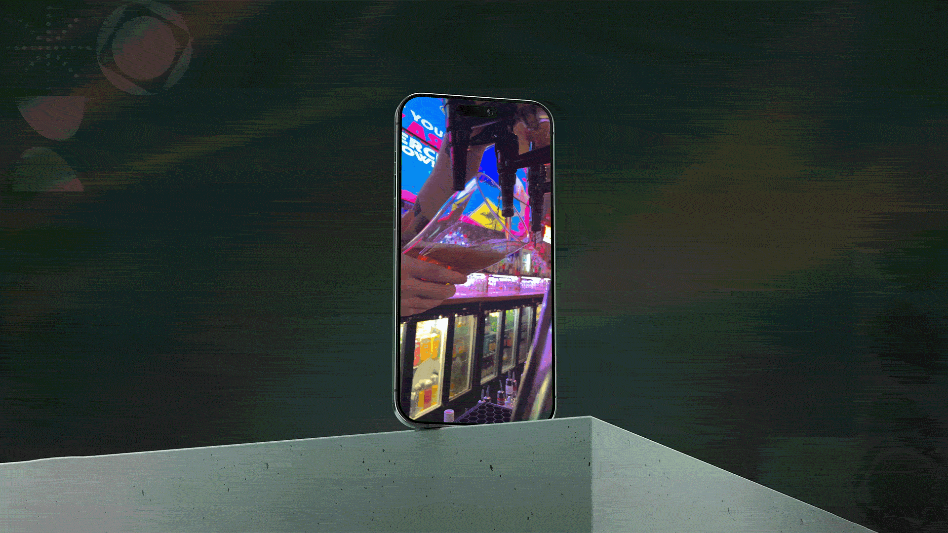 A hand holding an iPhone; on the iPhone, a selection of videos taken at the Stonegate content shoot, from sport to food and drink.