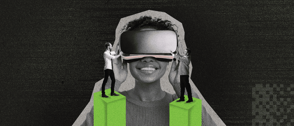 Two men standing on green columns, holding a VR headset over the eyes of a smiling woman.