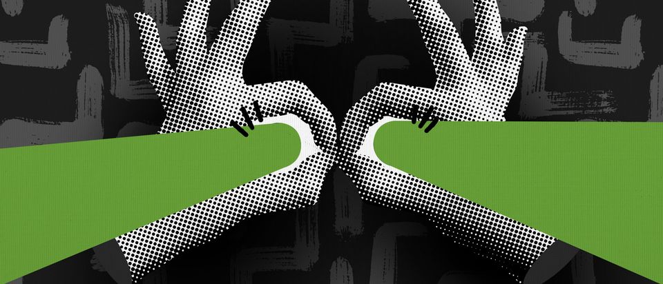 Hands in the shape of binoculars, with green beams shooting out of them.