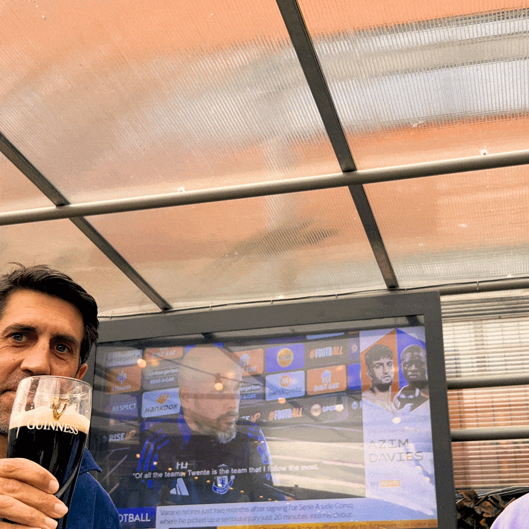 A group of friends clinking a range of drinks at Walkabout.