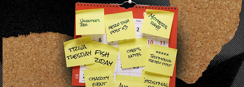 Calendar covered with sticky notes listing upcoming social media content ideas and events.