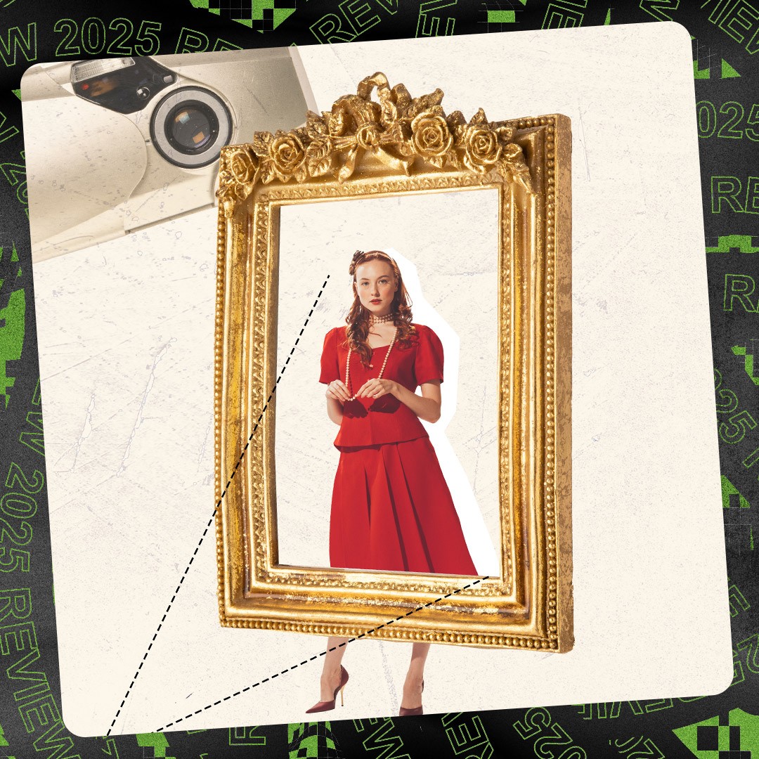 A woman in a red dress framed by a golden picture frame. 