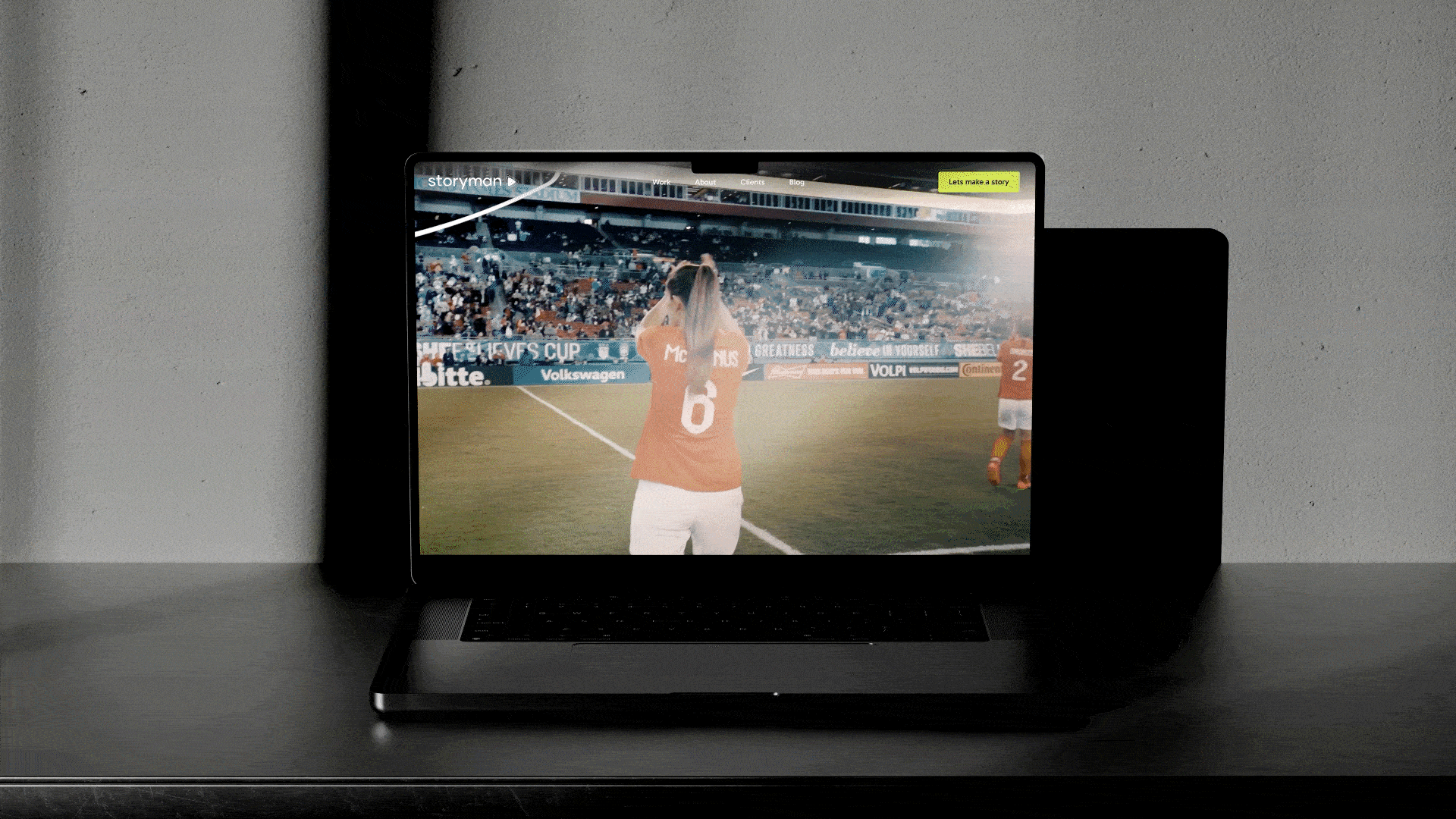 A laptop showing a couple of seconds of an atmospheric sports film by Storyman. 