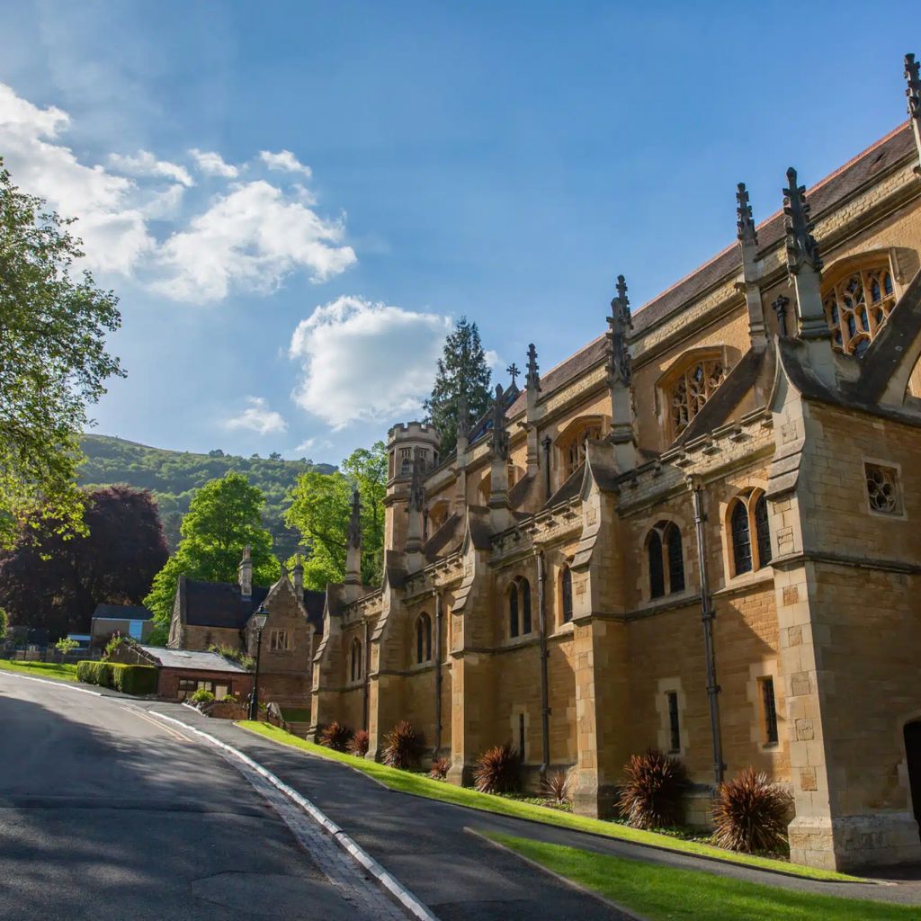 The traditional spires of Malvern College on a sunny day.
